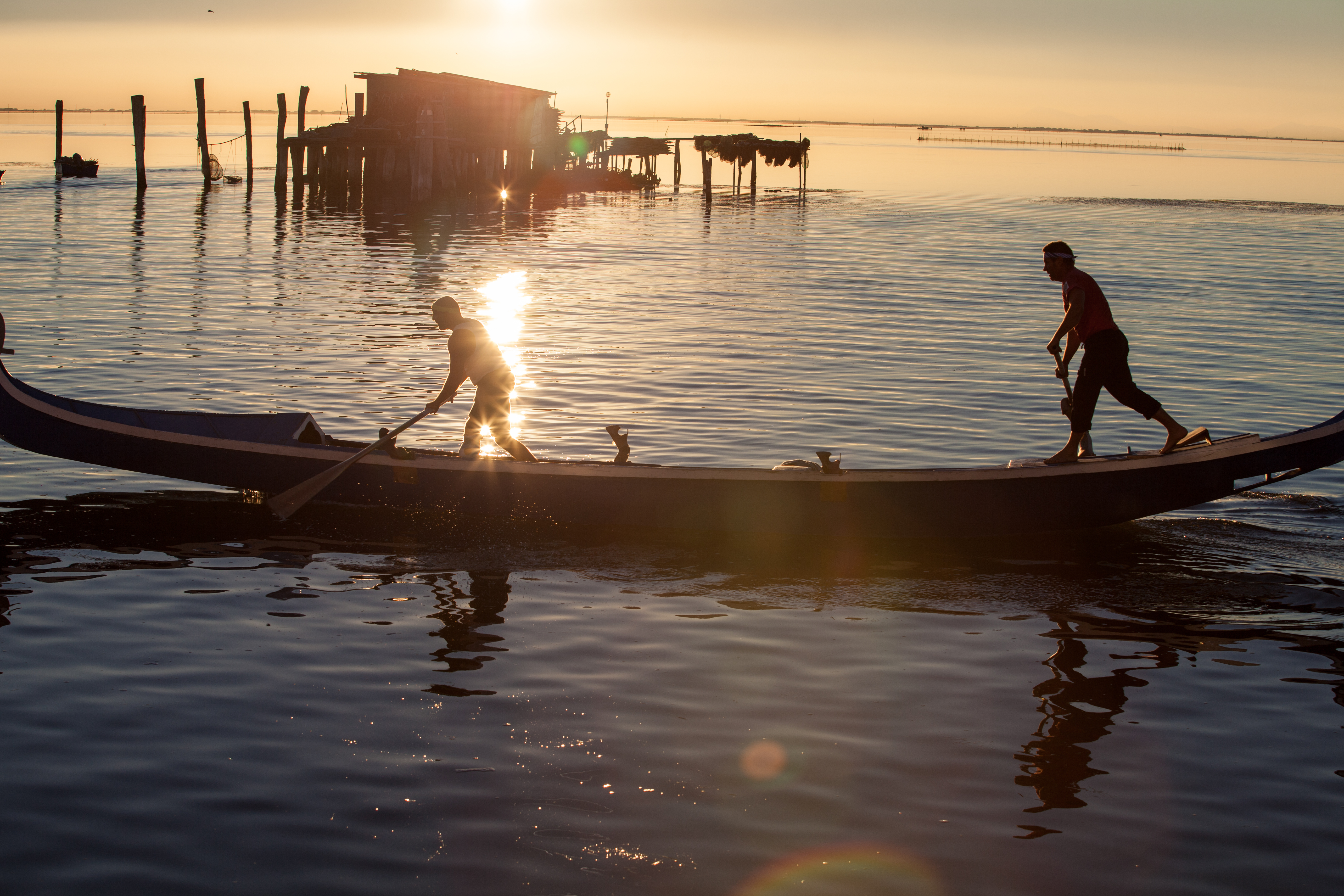 Pescatori nella laguna di Venezia